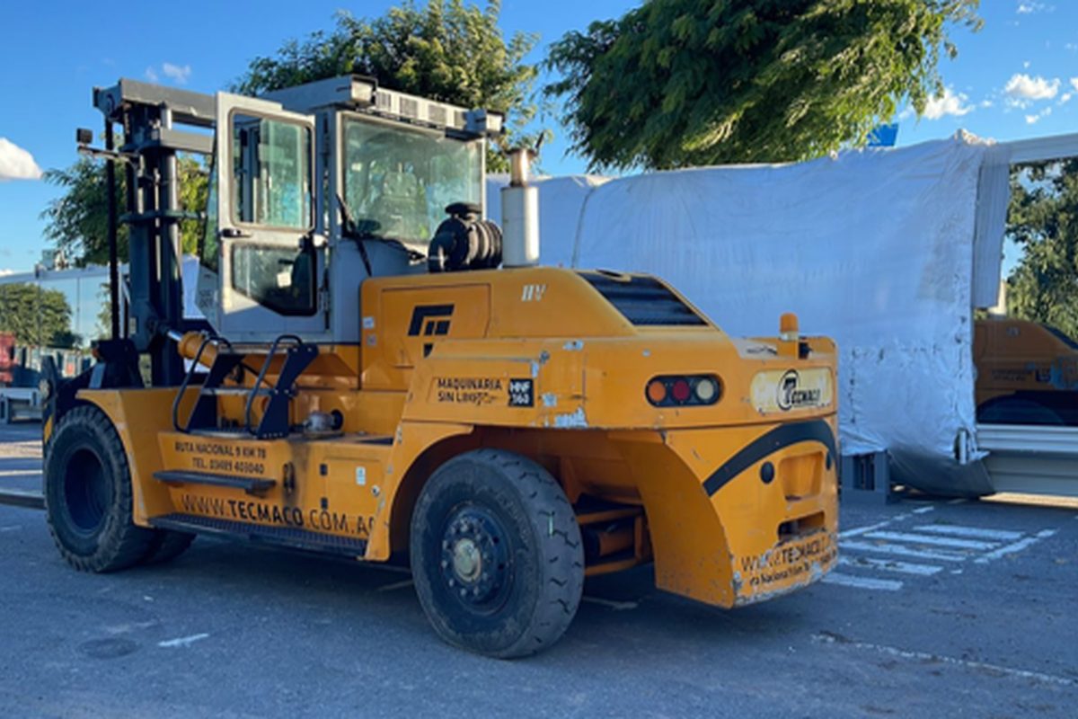 Heavy-duty forklift handling packed cargo